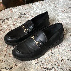 Elegant Black Loafers with Gold Accents